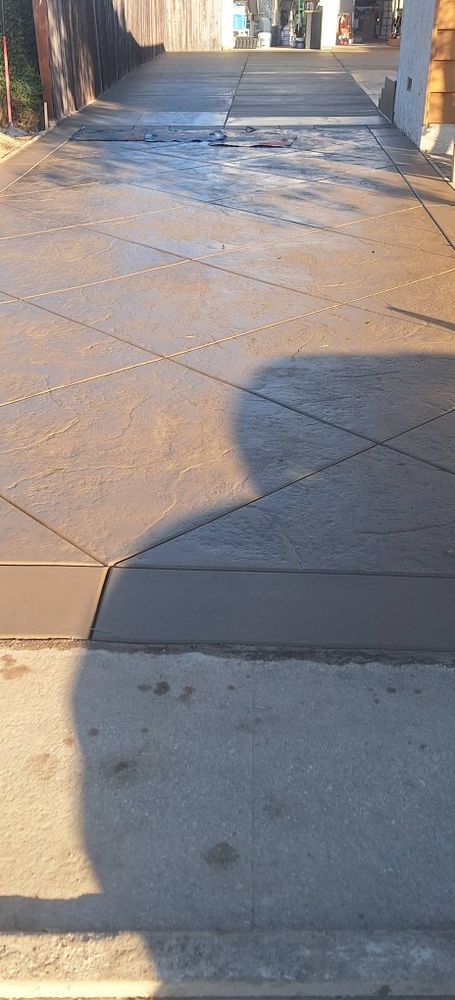 Transform your outdoor space with our expert stamped concrete installation, offering beautiful, durable surfaces that mimic natural stone at a fraction of the cost. Enhance your home’s curb appeal effortlessly. for Complete Concrete in Torrance, CA