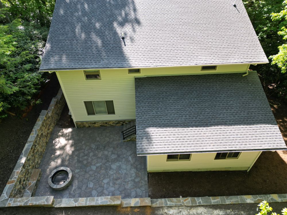 Our expert metal roofing service offers durable, energy-efficient solutions for your home, ensuring long-lasting protection and aesthetic appeal. Trust our skilled team to enhance your property with quality craftsmanship. for JV Hardscape & Construction Inc in Hendersonville, NC