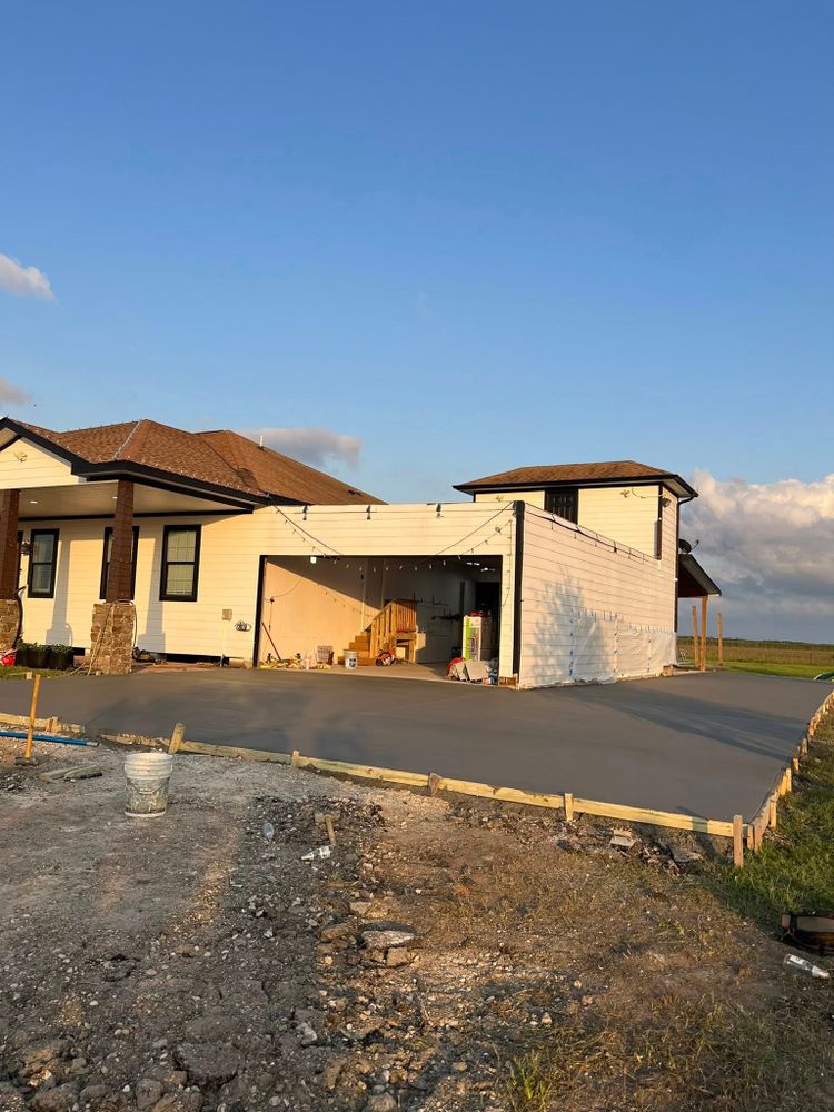 Enhance your home's curb appeal and safety with our professional sidewalk installation service, offering durable concrete solutions designed to withstand weather while complementing your property's aesthetic seamlessly. for Torres Construction & Concrete Worx in Alvin, TX