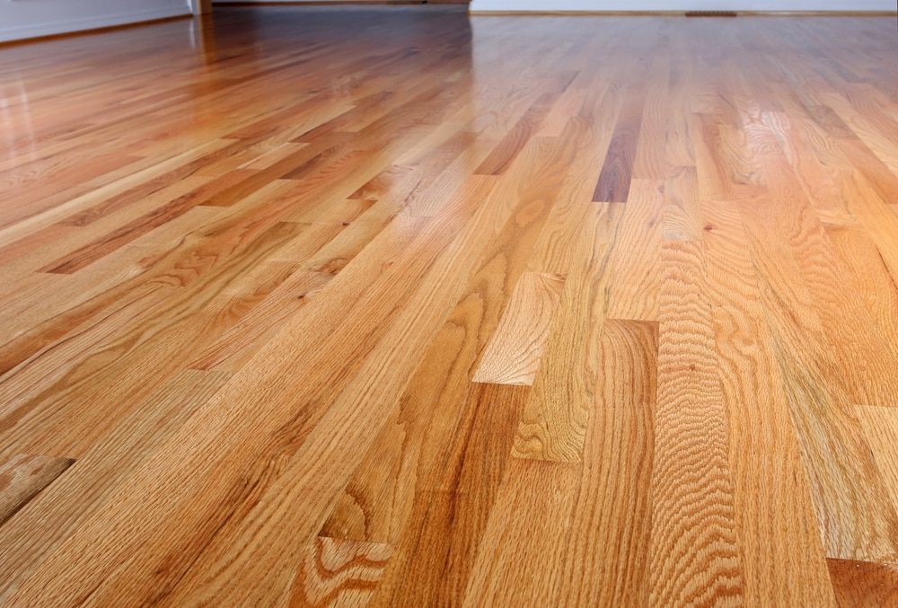 Our flooring service offers homeowners expert installation of a variety of styles, including hardwood, tile, and laminate. We provide quality materials and precise craftsmanship to enhance your home's beauty. for HighMark Contractors LLC  in Zimmerman, MN