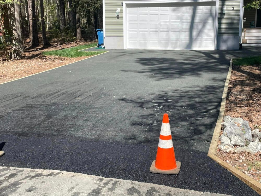 Our Asphalt Maintenance service includes crack sealing, pothole repair, sealcoating, and striping to protect your driveway or parking lot and enhance its appearance for long-lasting durability. for O.C. Paving in Dagsboro, DE