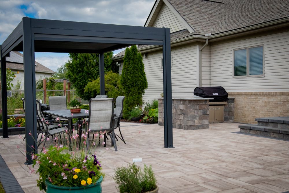 Enhance your home with our Outdoor Living Spaces, creating stylish, multi-feature and functional areas for relaxation and entertainment in your yard using premium materials expertly installed by our skilled team. for Sunstone Construction in Oakland County, MI