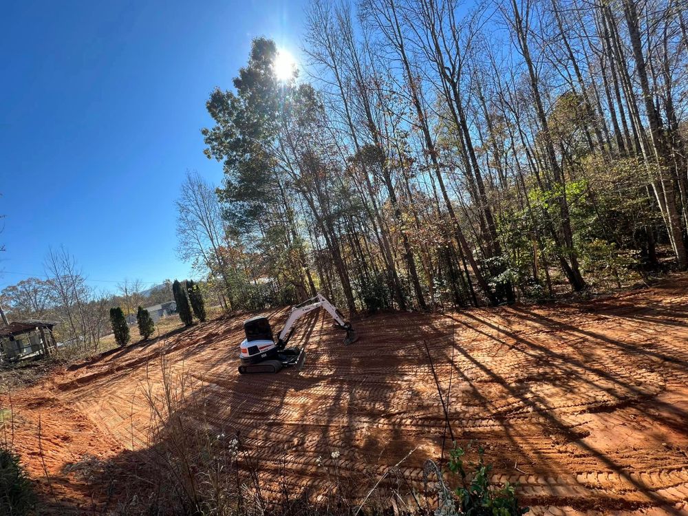 Our Land Clearing & Demolition service efficiently prepares your property for new projects, removing unwanted structures and debris while ensuring a smooth foundation setup, enhancing safety and readiness for construction. for OCD Landworks in Lenoir, NC