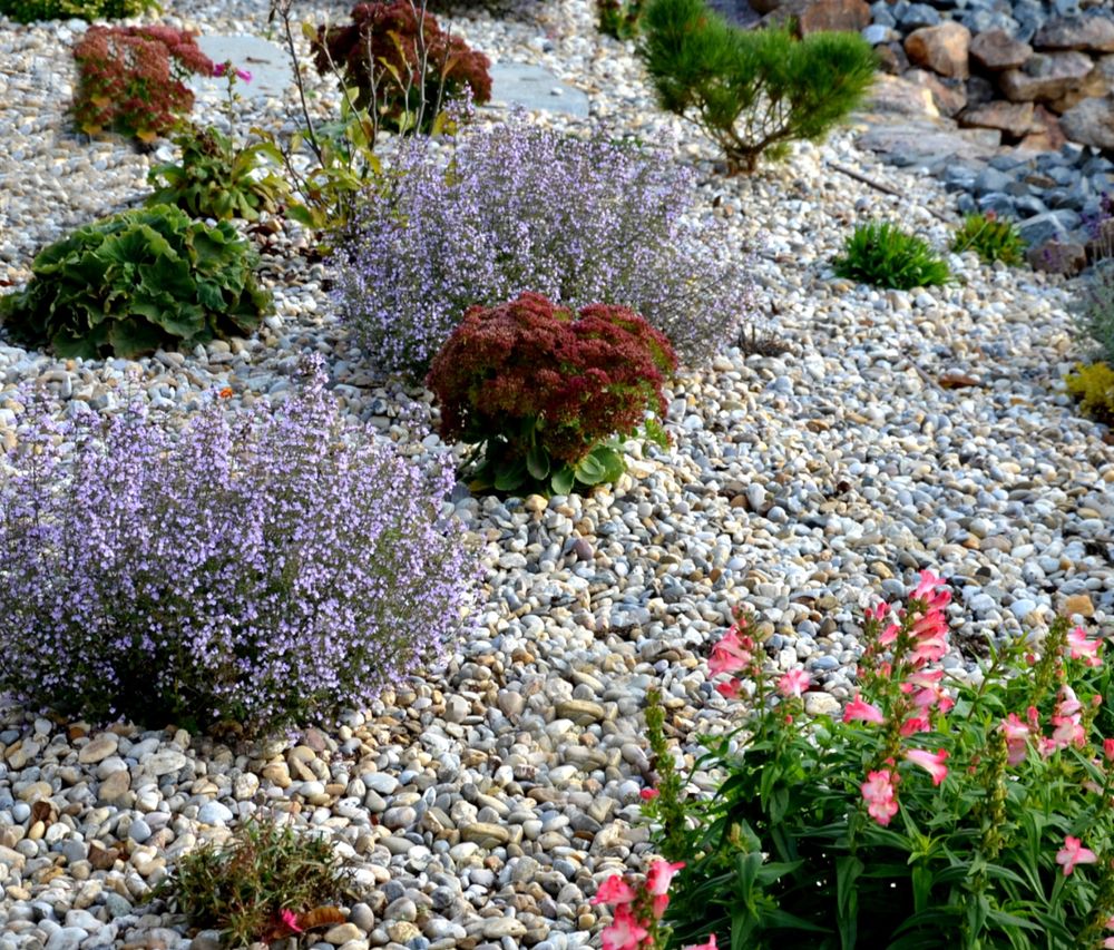 Enhance your home's curb appeal with our expert stone veneer installation service, providing durable and aesthetically pleasing small rock installations that transform any outdoor space into a stunning landscape feature. for WD Lawn Services in Loganville, GA