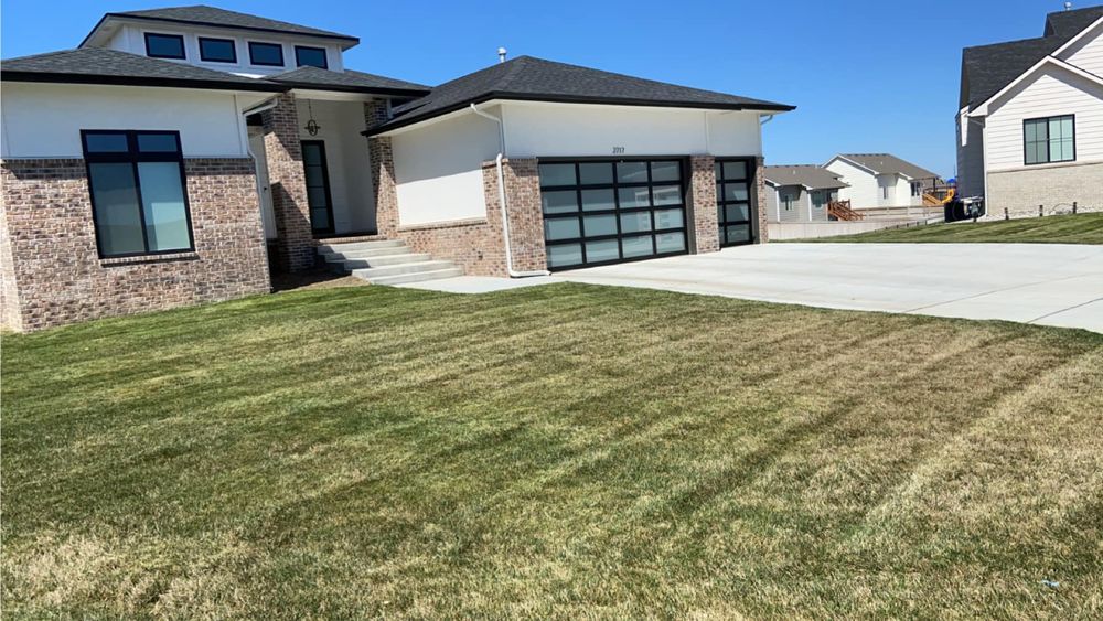 Improve your lawn's health and appearance with our professional aeration service, enhancing soil oxygenation, nutrient absorption, and water penetration for stronger roots and a lush, resilient turf. for C & C Lawn and Landscape in Bel Aire, KS