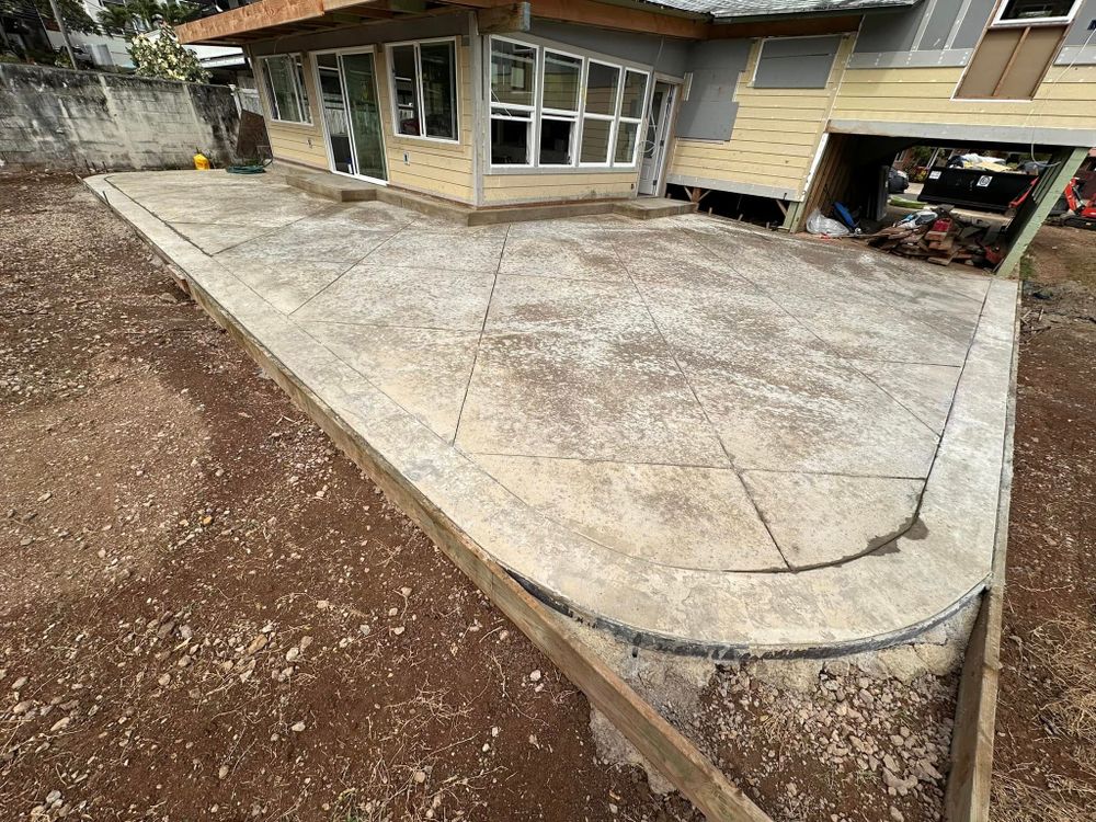 Transform your outdoor space with our Stamped Concrete Installation service, providing durable and stylish designs that mimic natural stone, brick, or tile. Enhance curb appeal with personalized patterns and colors. for Maka’s Akamai Masonry LLC in Kaneohe, HI