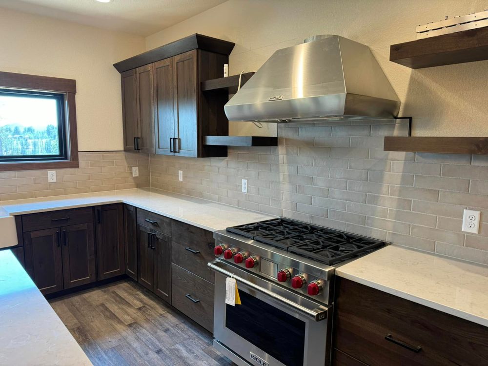 Enhance your kitchen's aesthetic with our expert backsplash tiling service, offering personalized designs and professional installation to complement any style. Trust us for a seamless blend of functionality and beauty. for Dakota Tile & Stone in Belle Fourche, SD