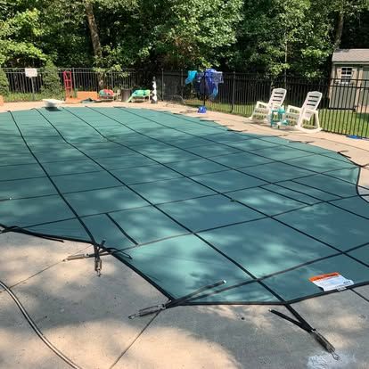 Ensure peace of mind with our professional Safety Cover Installations. Our durable, high-quality covers protect your pool year-round, enhancing safety for children and pets while preserving water quality and reducing maintenance. for Semper Fi Pools in Vineland, NJ
