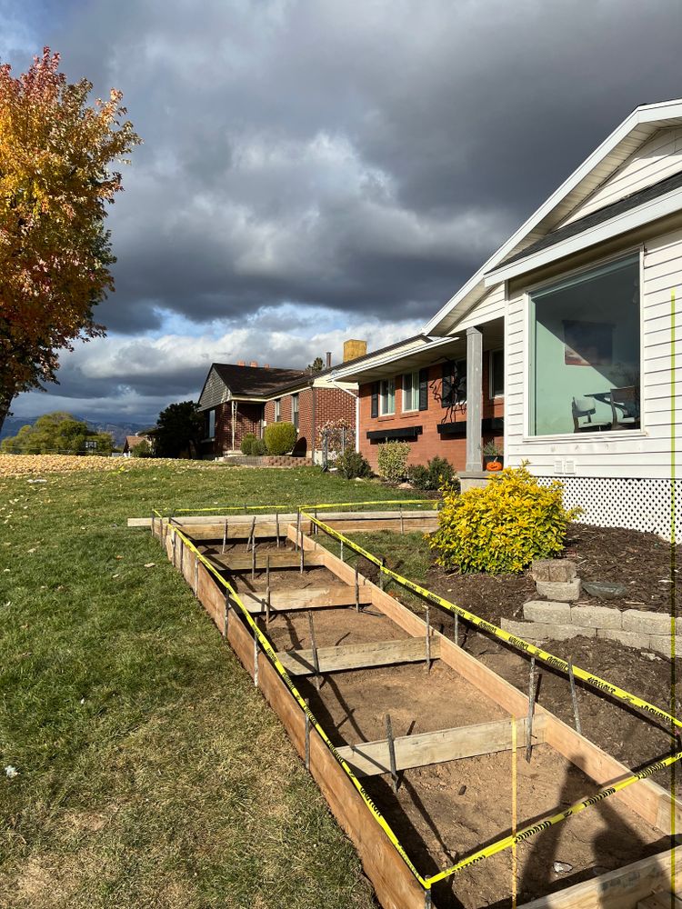 Our Site Preparation service ensures a smooth foundation for your project by expertly clearing, leveling, and stabilizing the land. Trust us to prepare your site for flawless concrete installation every time. for TNT Concrete and Construction LLC in Roy, UT