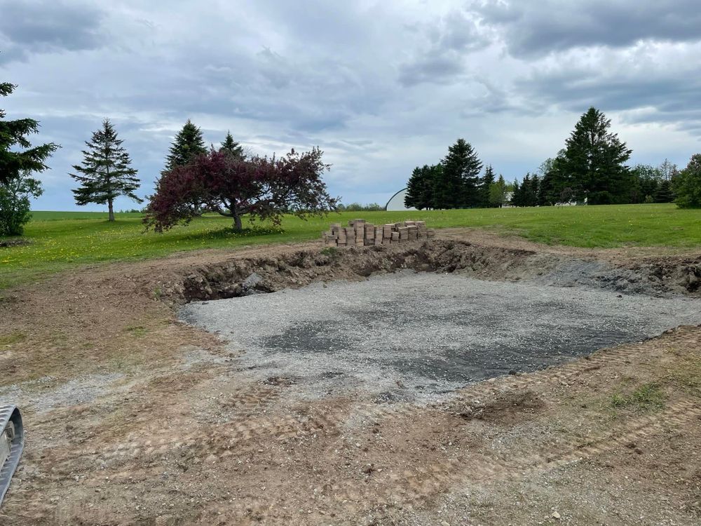 General excavation includes slab prep, pool pads, concrete hammering and tear out, septic lines, waterlines, electrical, land clearing and more!! for Sweetser Excavation LLC in Presque isle, ME