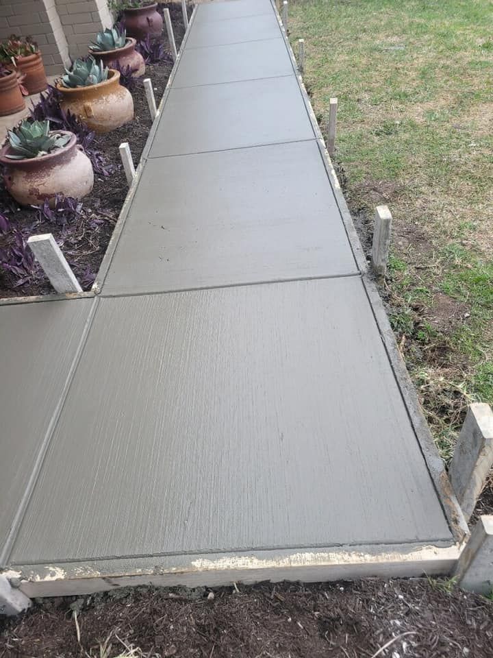 Enhance your home with our expert sidewalk installation service, providing durable, aesthetically pleasing concrete pathways designed to complement your exterior and ensure safety, longevity, and curb appeal for any property. for BMX Concrete in Bastrop, TX