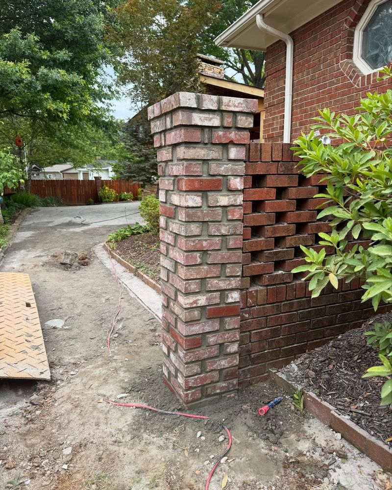 Enhance your home's aesthetics and durability with our expert masonry services. We specialize in designing, constructing, and repairing stunning brickwork and stone features that elevate your property’s value and charm. for Tavarez Designs LLC in Huntsville, AL