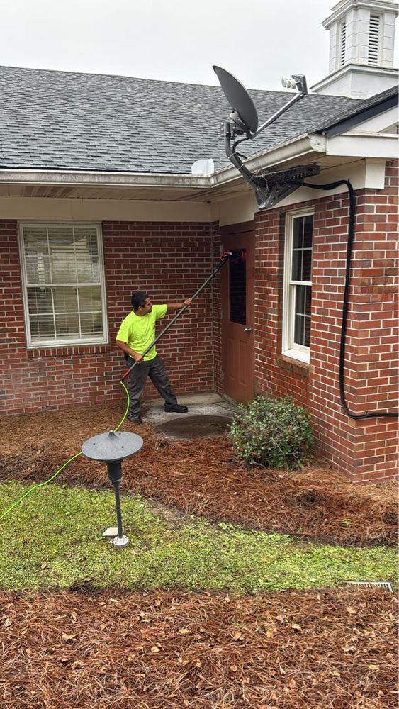 Our Soft Washing Services use gentle, low-pressure techniques combined with eco-friendly cleaning solutions to safely remove dirt, algae, and mold from delicate surfaces like roofs and siding without causing any damage. for Carter & Son's Pressure Washing in Valdosta, GA