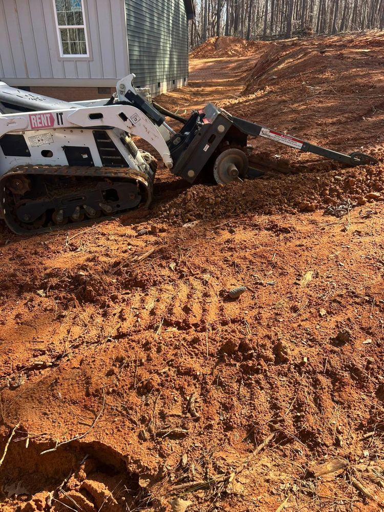 Enhance your property with our expert land grading service, ensuring optimal drainage and a level foundation for future landscaping projects, improving yard functionality and boosting overall curb appeal. for 1UP Services LLC in Starr, SC