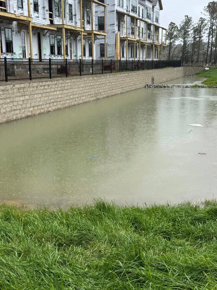 Our Retaining Wall Construction service enhances your property's landscape with durable, aesthetically pleasing walls designed to prevent soil erosion while adding structural support and visual appeal to your outdoor space. for Hometown Hardscapes LLC in Ridgeville, SC