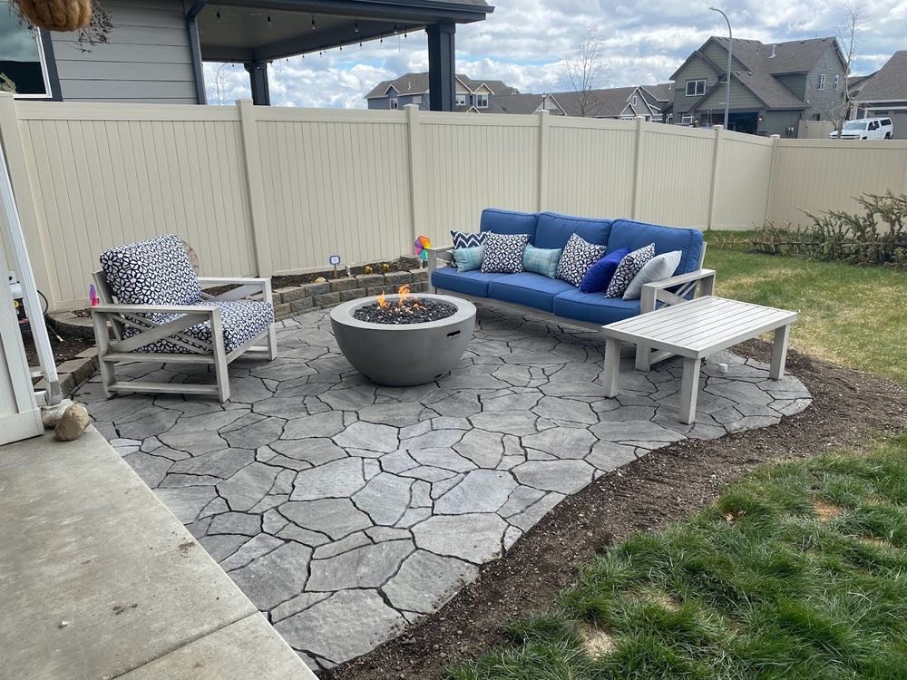 Transform your outdoor space with our Patio Design & Construction service, offering customized solutions that enhance beauty and functionality, using high-quality materials to create stunning patios tailored to your vision and lifestyle. for Ida-Home Hardscapes in Coeur d'Alene, ID