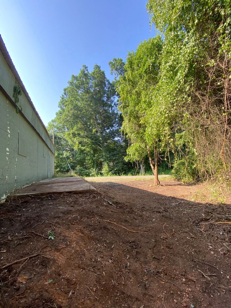 Our Land Grading service expertly levels and shapes land, ensuring proper drainage and a stable foundation for your landscape or construction project, enhancing both functionality and aesthetic appeal of your property. for Upchurch Property Management in Vass, NC