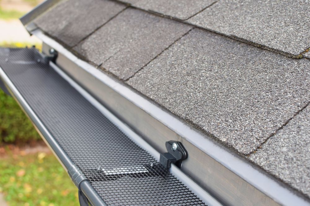 Our Residential Gutter Cleaning service ensures your gutters are debris-free, preventing water damage and maintaining home safety, with efficient professionals dedicated to preserving your property’s integrity all year round. for Lee’s Hill Top Contracting in Oxford, NC