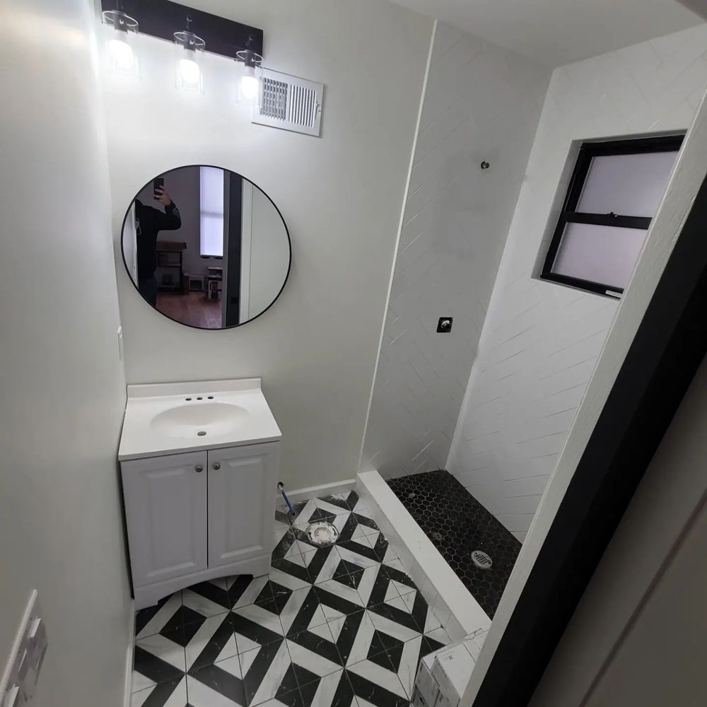 Upgrade your bathroom with our expert renovation services, offering customized designs, quality materials, and professional craftsmanship to enhance both functionality and aesthetics in your personal sanctuary. Transform your space effortlessly today. for Lauro General Construction in Newark, NJ