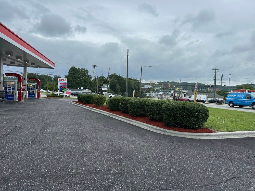 Enhance your home's curb appeal with our expert Shrub Trimming service, ensuring precise cuts and healthy growth for beautifully shaped shrubs that complement and elevate your landscape's aesthetic. for Queen’s Landscaping in Kernersville, NC