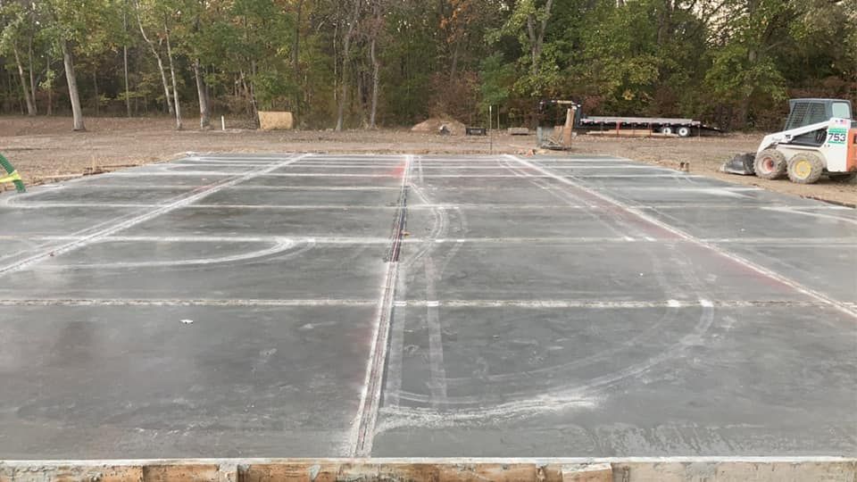 Our skilled team offers professional concrete slab construction services to homeowners, providing a durable foundation for their property. We prioritize quality materials and expert craftsmanship for lasting results. for Kruse Concrete Construction  in Donnellson, IA