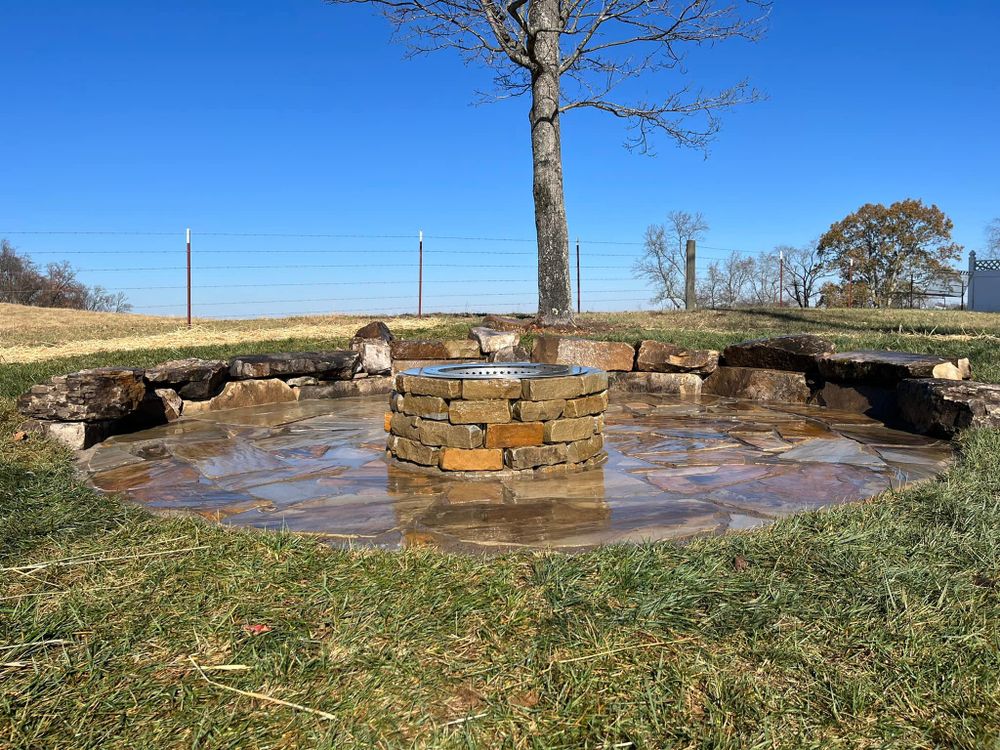 Our Dirt Work service expertly transforms your outdoor space, preparing the ground for landscaping projects by leveling surfaces, improving drainage, and ensuring a solid foundation for beautiful and sustainable garden designs. for Smoky Mountain Landscaping in Maryville, TN