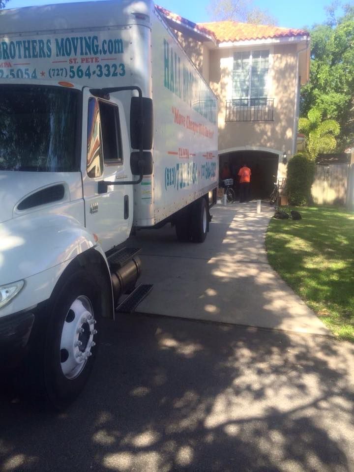 Our long-distance moving service ensures a seamless relocation experience, utilizing expert movers and top-of-the-line equipment to safely transport your belongings across state lines with ease and efficiency. for Hall Brothers Moving  in Tampa, FL