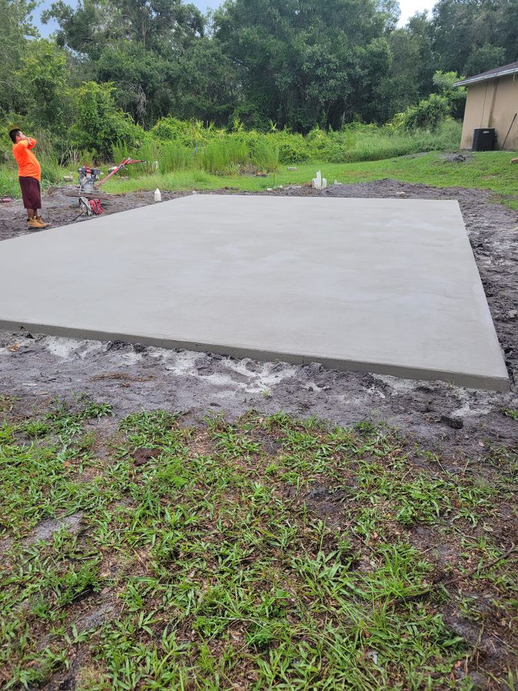 Transform your outdoor space with our expert stamped concrete installation service, offering a durable and aesthetically pleasing finish that mimics natural stone or brick to enhance your home's curb appeal. for Ferrer Construction in Arcadia, FL