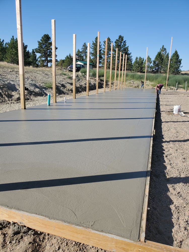 Our Concrete service offers homeowners expert solutions for improving their property's exterior through durable and aesthetically pleasing concrete structures, such as driveways, patios, and walkways. for Pinewood Construction. LLC in Miles City, MT