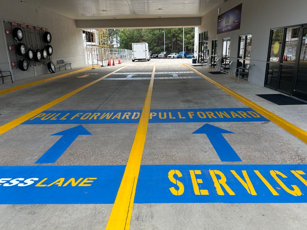 Our Parking Lot Line Striping service enhances the curb appeal of your property by creating clean, organized parking spaces, ensuring safety for both tenants and customers. for FunderFlow Commercial and Residential Pressure Washing Inc in Tupelo, MS