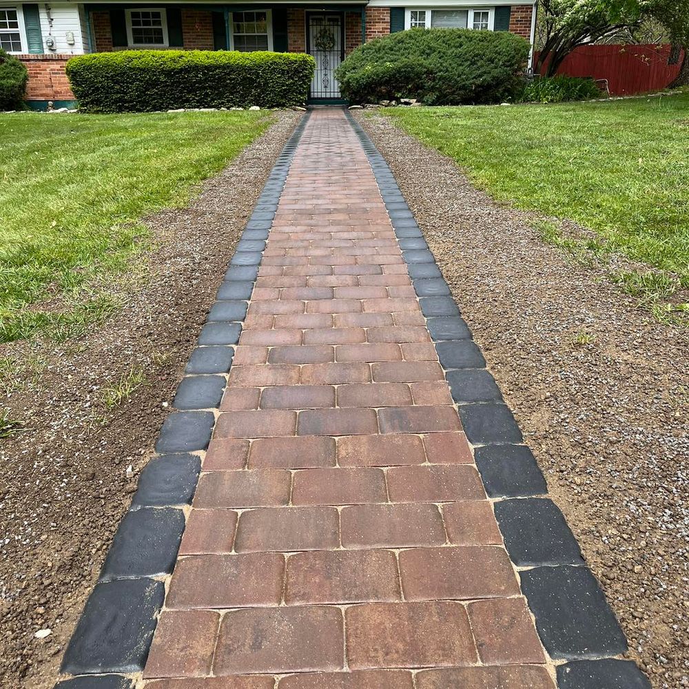 Enhance your home's curb appeal with our expert Steps & Walkways service, providing durable and aesthetically pleasing pathways that seamlessly integrate into your landscape design for functionality and beauty. for New Image Outdoor Solutions in Dayton, Ohio