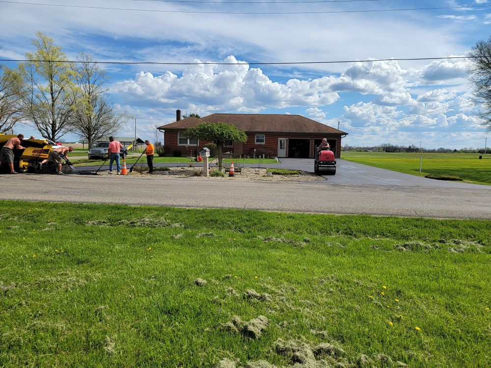 Enhance your home's curb appeal with our expert driveway paving services, providing durable, smooth asphalt surfaces tailored to meet your needs and withstand the test of time for years to come. for Smith's Paving and Sealcoating in Rushville, IN