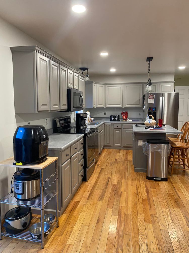 Revitalize your kitchen with our expert cabinet refinishing services. We transform worn surfaces into stunning, like-new finishes, boosting aesthetics and home value while saving you time and money compared to replacements. for Surface Painting Company in Cortland, NY