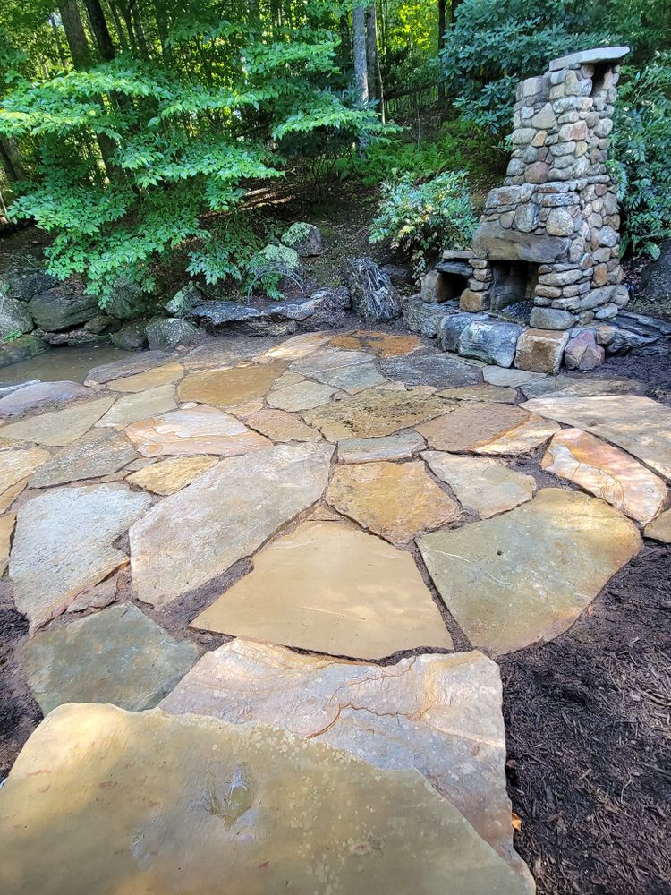 Enhance your outdoor living space with our natural stone hardscape service, providing durable and elegant designs that seamlessly blend with your landscape, creating a beautiful and functional extension to your home. for C4 TrueVision Renovations in Asheville, NC