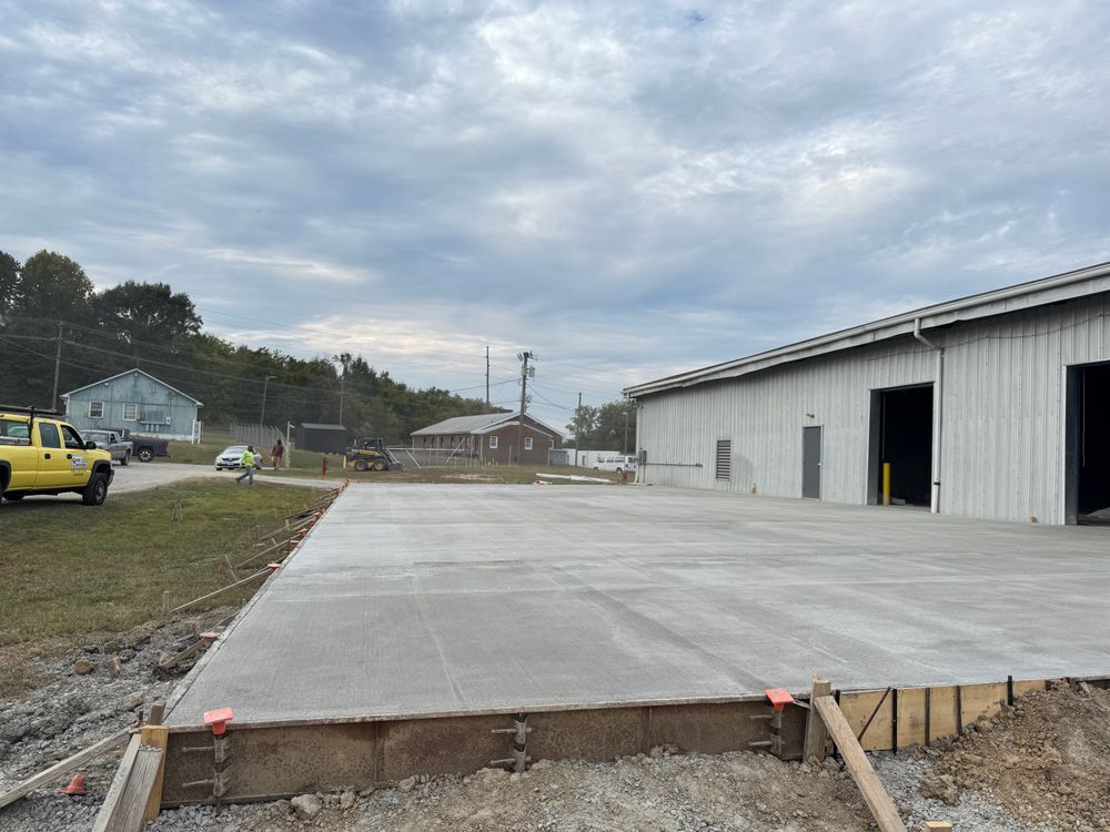 Our Concrete Work service delivers durable slabs, driveways, and pads with precise site prep. Using a skid steer loader, we create smooth, reliable surfaces built for long-term performance. for Hunt’s Hauling & Landworks LLC in Danville, VA