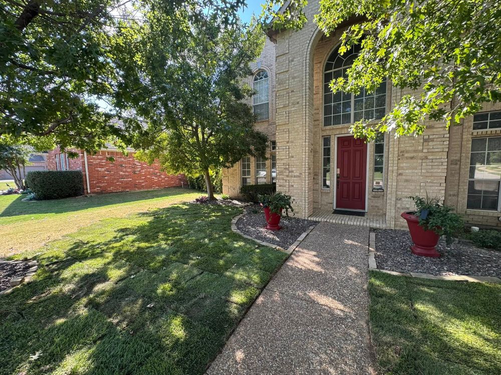 Enhance your home's curb appeal with our expert lawn maintenance services, providing regular mowing, trimming, and care to ensure a lush, beautifully manicured lawn all year round. for Stonewood Outdoor Services in Arlington, Texas
