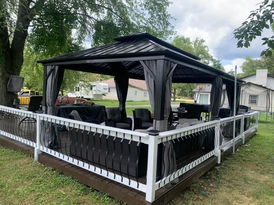 Transform your outdoor space with our custom gazebo services, offering expert design and installation. Enhance relaxation and aesthetics in your yard, providing a perfect venue for gatherings or personal oasis retreat. for Custom Carports and Shelters in Greensburg, IN