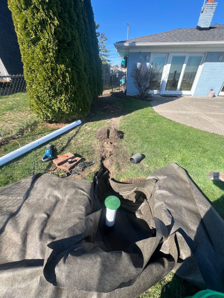 Buried downspouts for Alltimate Outdoor Services in Warren, MI