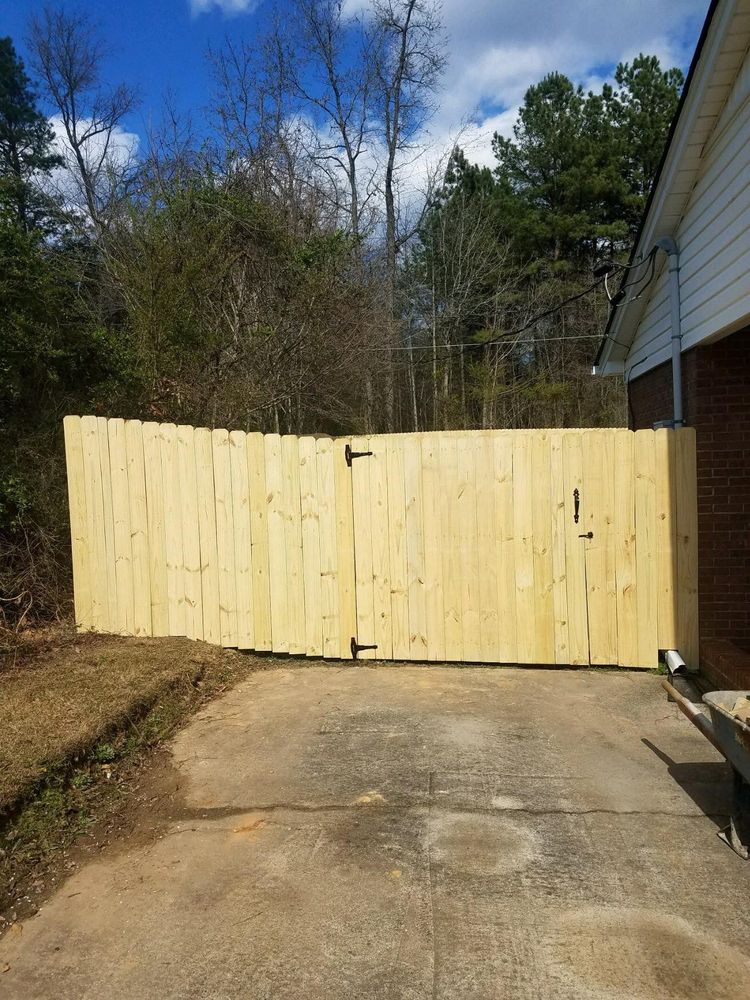 Enhance your pool area with our durable and stylish fences, ensuring safety and privacy for your family. We offer customizable designs to seamlessly integrate beauty and security into your outdoor space. for Passmore Construction LLC in Dallas, NC