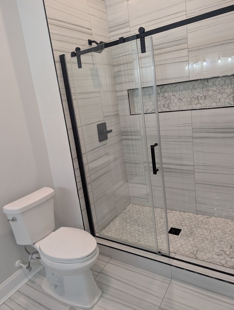 Transform your bathroom into a beautiful, functional space with our expert renovation services. We offer tailored designs, quality materials, and skilled craftsmanship to meet all your remodeling needs seamlessly. for Supreme Remodeling in Wilson, NC