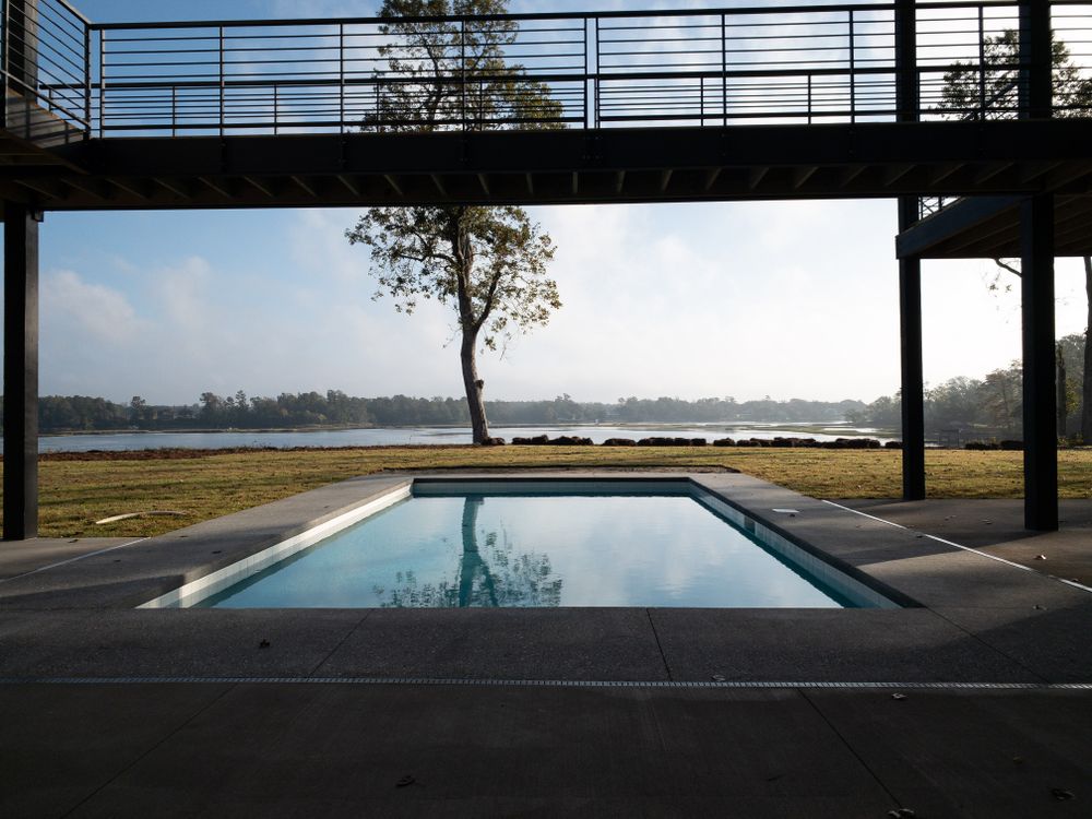 Enhance your outdoor space with our concrete services, specializing in durable and stylish pool decks. Transform your backyard into a beautiful oasis with our expertly crafted concrete solutions. for Rock Solid Custom Concrete in Wilmington, NC