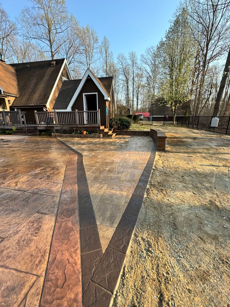 If you're looking to improve your outdoor living space, our Patio Design & Construction service is perfect for you. We can help design and build a patio that perfectly fits your needs and style. for Keyes Exteriors in Stafford, VA