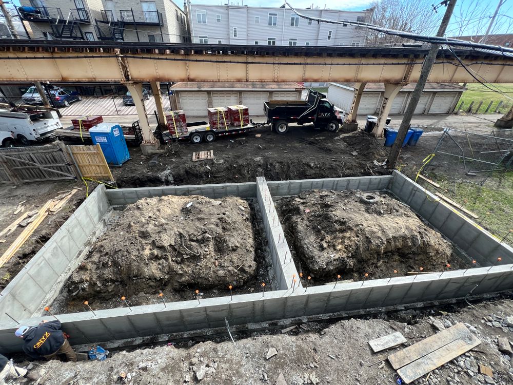 Our Foundation & Excavation service includes expertly preparing the site for concrete work by ensuring the foundations are strong and properly laid out, providing a solid base for your projects. for Onyx Concrete Contractors in Chicago, IL