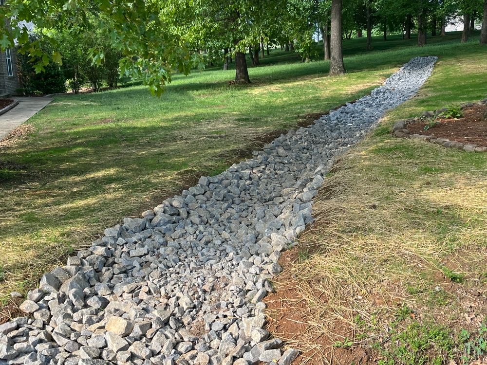 Enhance your home's landscape with our expert drainage system install and repair service. Ensure water flows properly while protecting your yard's beauty. We also specialize in seamless fence repair for lasting durability. for Real Deal Lawn Care in Goodlettsville, TN