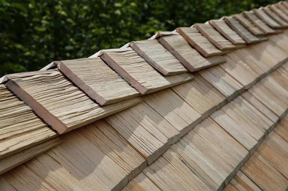 Upgrade your home with our premium wood shakes roofing service. experience natural elegance and durability while we expertly blend traditional charm with modern techniques alongside our expert metal roofing solutions. for Shope Legacy Builders, LLC in Canton, NC