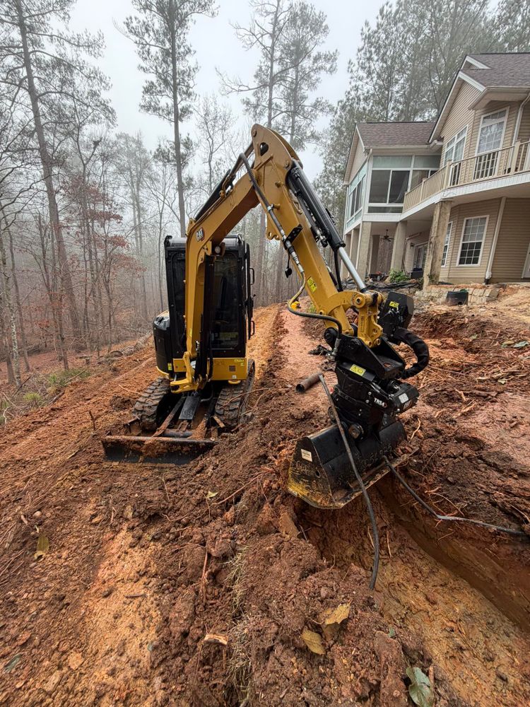 Our leveling service expertly prepares land by ensuring a smooth, even surface, addressing drainage issues and enhancing stability for future construction projects, guaranteeing your property's optimal foundation and aesthetic appeal. for Clarks Hill Property Solutions in McCormick, SC