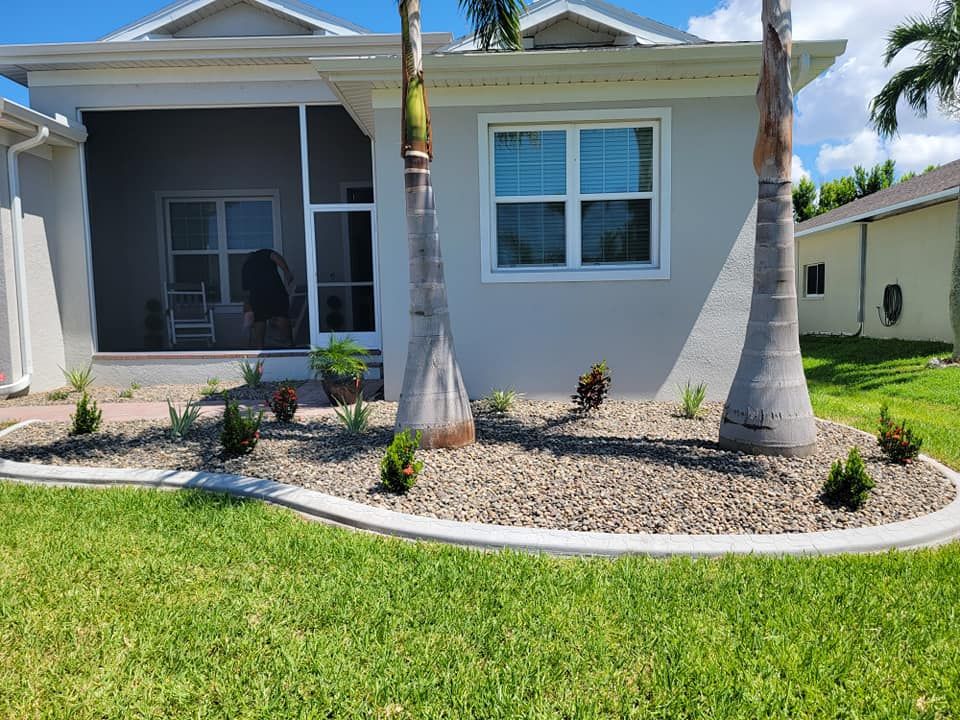 Our Continuous Flow Concrete Curbing service offers seamless and durable edging solutions for your landscaping needs, providing a clean and attractive finish to enhance the overall aesthetics of your outdoor space. for Advanced Landscaping Solutions LLC in Fort Myers, FL