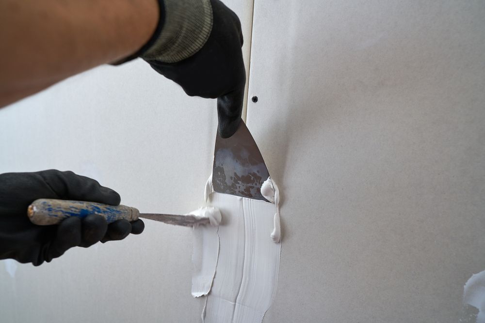 Enhance your home's interior with our expert drywall and plastering repair service, seamlessly fixing cracks and holes to create a smooth surface, ready for a flawless painting finish. for Brush Bro’s in Hollis, ME