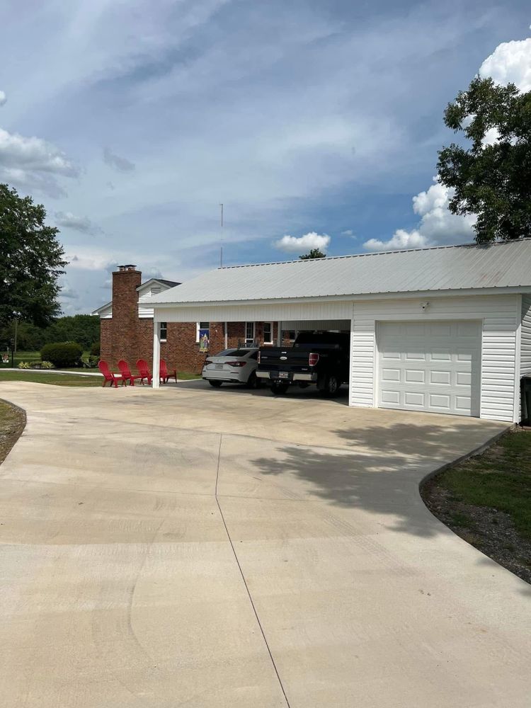 Our Concrete Pads Driveways service delivers durable, attractive driveways concrete homeowners trust, with expert installation, proper grading, and long-lasting performance that enhances curb appeal, functionality, and value for your home. for Quality Construction and Design, LLC in Gaffney, SC