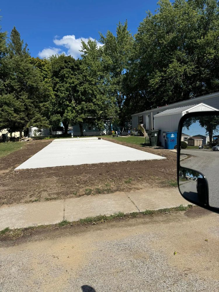 Transform your home's outdoor spaces with our professional concrete services. We offer expert installation, repair, and design solutions to enhance durability and aesthetic appeal for driveways, patios, walkways, and more. for B & E Concrete in Michigan City, IN